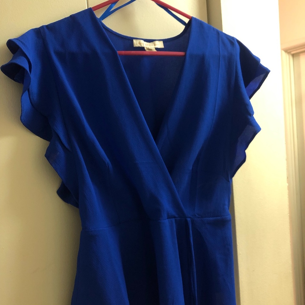 Royal blue dressy blouse. Short sleeves. Never worn